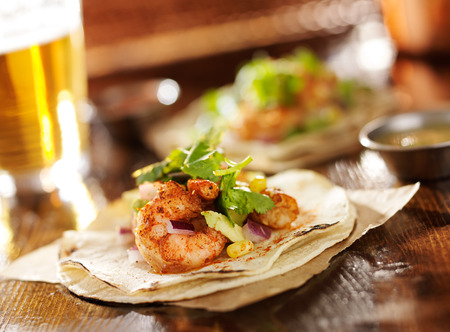 spicy shrimp avocado tacos in slanted compositionの写真素材