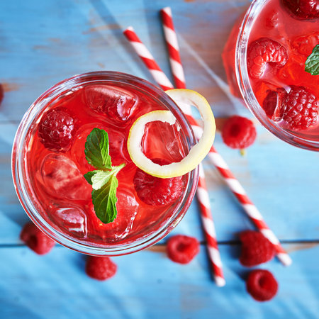 colorful raspberry cocktail overhead close up