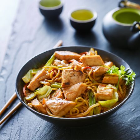 bowl of japanese chicken yakisobaの写真素材