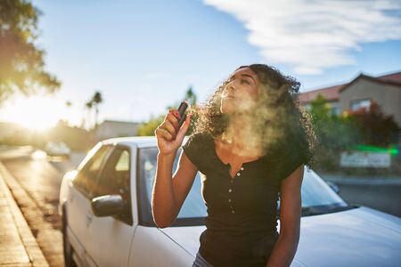 african american woman vapingの写真素材