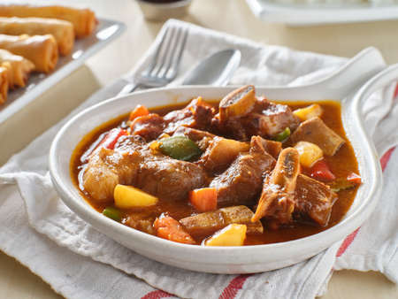 filipino beef kaldereta in bowlの写真素材