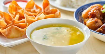 chinese egg drop soup in bowlの写真素材