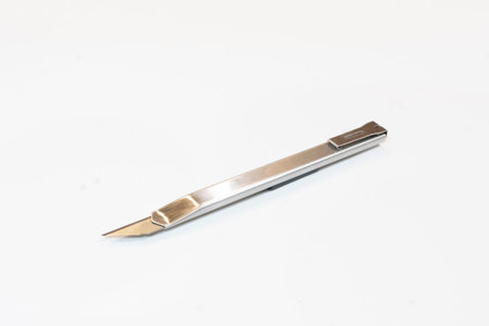 stationery knife on white background isolate cutter stationery