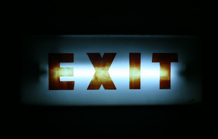 Exit Sign set on blackの写真素材