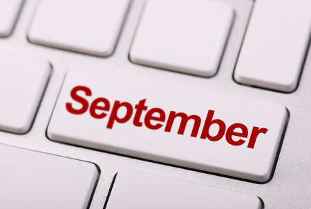 A computer keyboard with the word september written on it.の写真素材