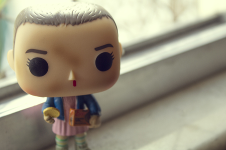 Rio de Janeiro, Brazil. September 30, 2018. Illustrative editorial of Funko Pop action figure of Eleven with eggos, fictional character from the Netflix series Stranger Things.のeditorial素材
