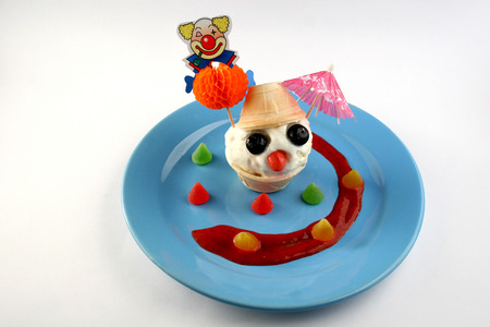 Ice-cream snowman with berries, decorated with fruit jellyの写真素材