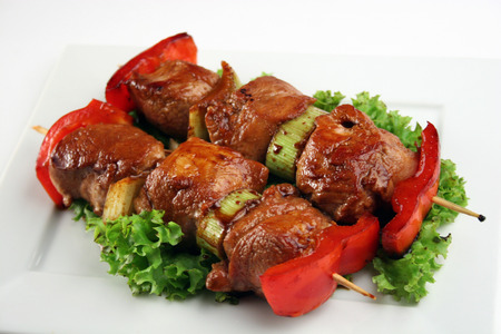 Traditional asian yakitori with beef, sweet pepper, leek and saladの写真素材