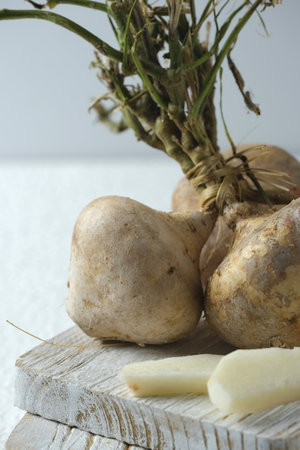 Isolated jicama on white background. Fresh and healthy food. Bengkuangの写真素材