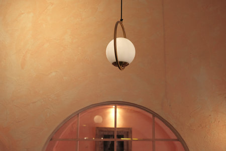 Beautiful interior in room. Lights on pink wall as ornament for decoration.