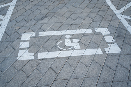 Road marking on the asphalt with parking spaces for the disabledの写真素材