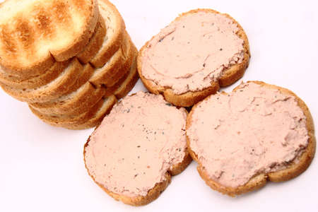 There are some toasts with herbs pate. の写真素材