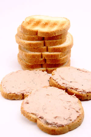 There are some toasts with herbs pate. の写真素材