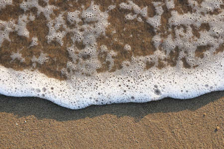 Abstract of the sea meet the sand with copyspaceの写真素材