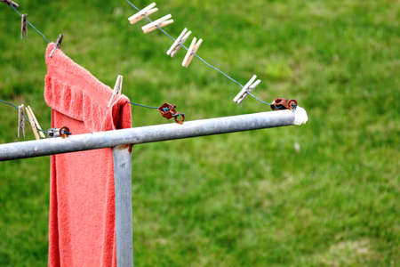 Detail of clothesline with laundryの写真素材