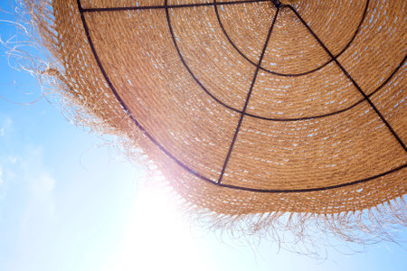 Umbrella on stunning tropical beach in a sunny day.の写真素材