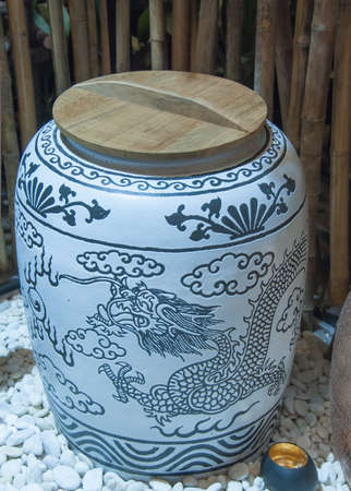 White Dragon jar with blue dragon painting in Thai style bathroomの写真素材
