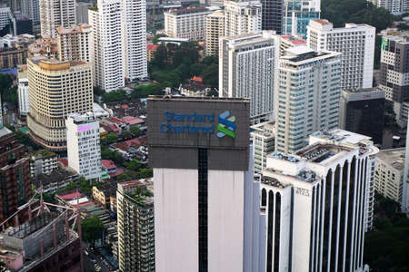 Close up view of Standard Chartered tower in Kuala Lumpur, Malaysiaのeditorial素材