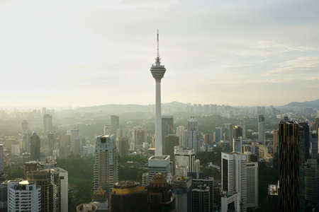 Beautiful scenic view of KL tower and other skyscrapers during the afternoonのeditorial素材