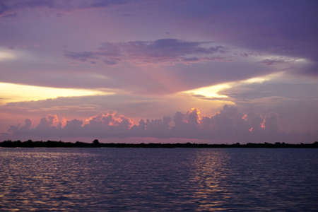 Beautiful view of sunset at Tonle Sap lake in Cambodiaの写真素材