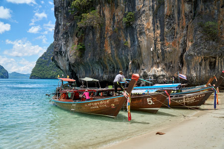 Wooden longtail boats at the beach of Laolading Island in Krabi, Thailandのeditorial素材
