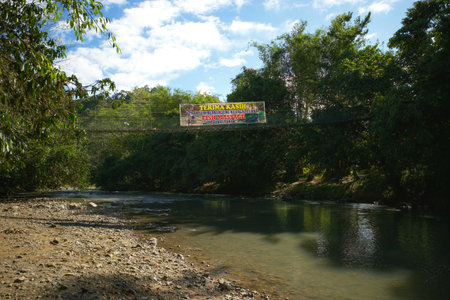 A sign in a Malay language means thank you for visiting Tagal Luanti Fish Massage at Ranau Sabahの写真素材