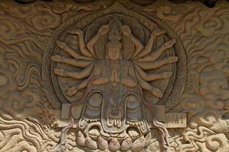Avalokitesvara wall carving sculptureのeditorial素材