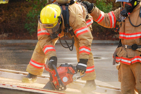 Vertical ventilation drill behind fire station using vent saw 