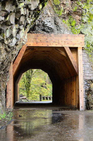 Old tunnel of Hwy 30 near Onenta Gorge along the Columbia River Gorge National Scenic area, Oregonの写真素材