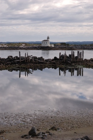 Coquille River Lighthouse and Pilings, Bandon Oregon, Low tideの写真素材