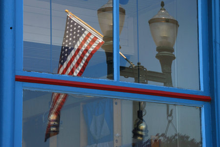 Reflexions of a Flag, Downtown Grants Pass Oregon has blossomed in a recent revival and the areas...