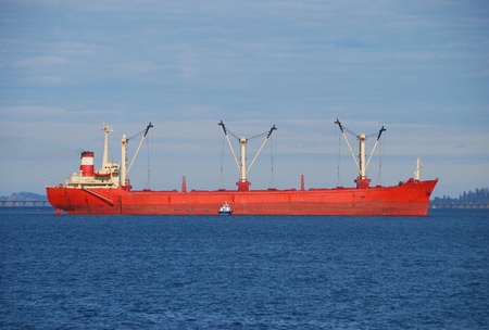 Freighters at wait in the entrance of the Columbia River   These ships are awaiting clearence by Homeland Security before finishing the trip up riverの写真素材