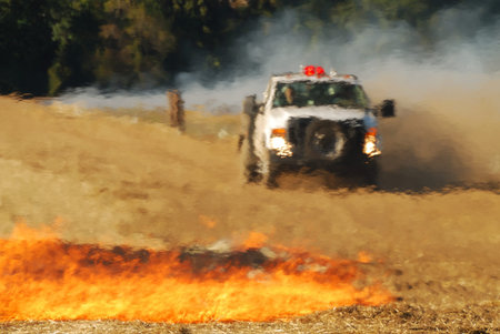 Oat grass stubble field burning on Mike Richie property in the Umpqua Valley near Roseburg Oregonの写真素材