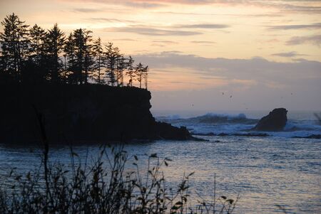 Sunset and surf at Sunset Bay State Park near Charleston Oregonの写真素材