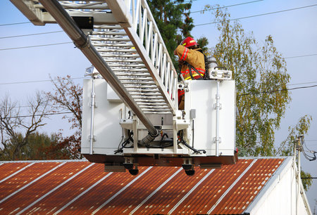Inservice training on a new 100 foot platform fire truck.  Working with ladder placement and...