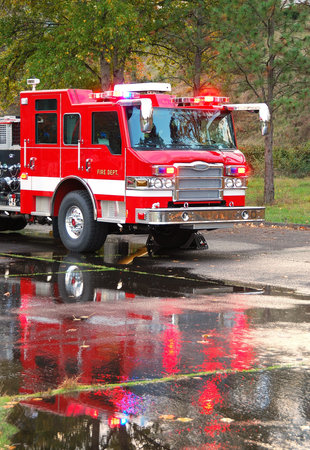 Inservice training on a new 100 foot platform fire truck   Working with ladder placement and...