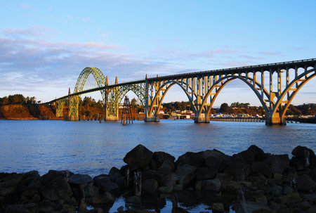 Yaquina Bay Bridge and Yaquina Bay, a steel arch bridge is a McCullough engineered masterpiece of the Pacific Coast Hwy System in Newport Oregonの写真素材