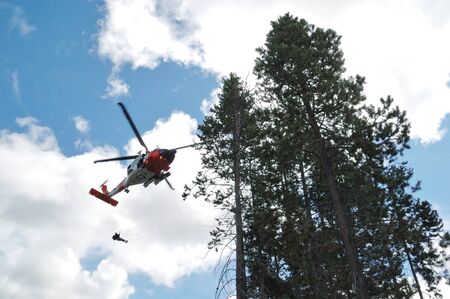 US 102nd Civil Support Team in training excersise utilizing a US Coast Guard Helicopter, Sunriver Oregon, May 7, 2007のeditorial素材