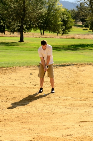 Golfer enjoying the links on a late summer afternoon in Oregonの写真素材