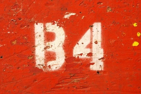 A interesting painted number on a wall in a agriculture barnの写真素材