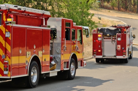 Roseburg, Oregon - July 31, 2013: Fire fighters respond to a structure fire in a residence that caused major interior damage.  No body was injured in the Roseburg, Oregon incident on July 13, 2013のeditorial素材