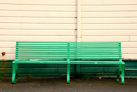 Unoccupied park bench in the Oaks Park area of Portland Oregon