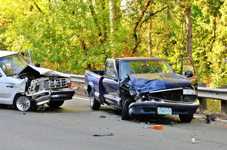 Two vehicle head-on accident, caused by one truck failure to yield,  results in no injuries at a rural intersection in Roseburg, OR on August 29, 2013のeditorial素材