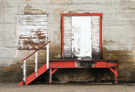 Old loading dock door to a  cold storage warehouse wall in the Wenatchee Washington area.の写真素材