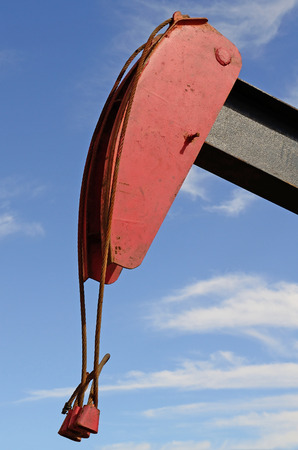 pumpjack, (nodding donkey,  horsehead pump, rocking horse, beam pump, dinosaur, sucker rod pump, grasshopper pump, Big Texan, thirsty bird, or jack pump) is the overground drive for a reciprocating piston pump in an oil well. in eastern Texasの写真素材