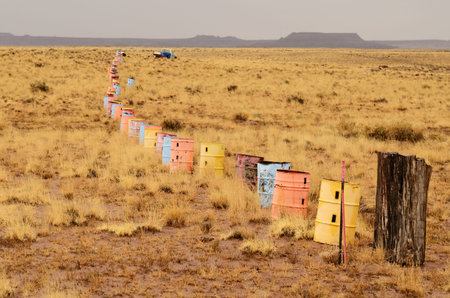 The high desert of northeastern Arizona as a rain storm rolls through along Intersate 40 as it  follows the original Route 66の写真素材