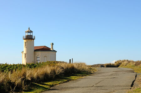 Coquille River Lighthouse built in 1896, is a 47 foot tower guided boats up the mouth of the Coquille River, in Bandon Oregonの写真素材