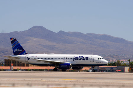 LAS VEGAS, NV, USA  - JUNE 24, 2014: A Jet Blue Airline Passenger Jet prepares for take-off at Las...