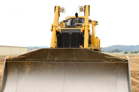 A large bulldozer at an construction site