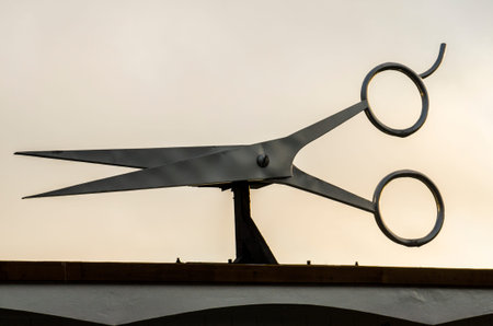 Large pair of sissors as a sign to a beauty or hairdressor shop
